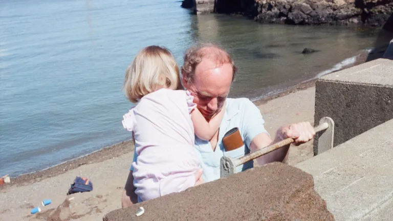 was u a tradwife in the 1980s? man-carries-daughter-up-ladder