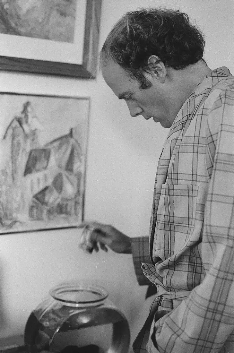 A Leap Year Leap: She Asked. He Said Yes. jon-newhall-feeds-goldfish