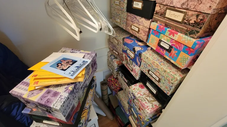 scan family photos closet-stores-boxes-of-family-phoots