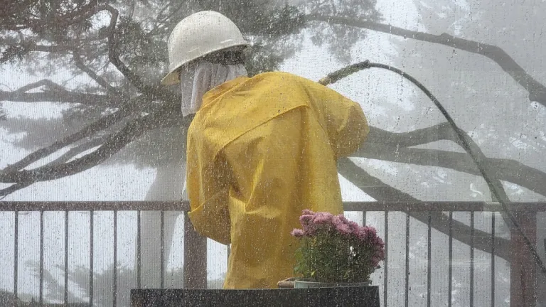 thanking people, including the man-power-washing-deck, Saeng Lattanatham