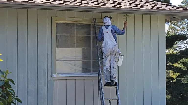 thanking people, including the man-painting-wood-siding, Saeng Lattanatham