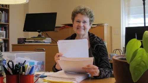 Barbara Falconer Newhall at her home office desk getting ready to do final edits on her book, "Wrestling with God." Photo by Barbara Newhall