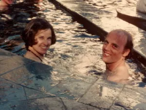 Barbara Falconer and Jon Newhall in a swimming pool circa 1975. Photo by Ruth Newhall