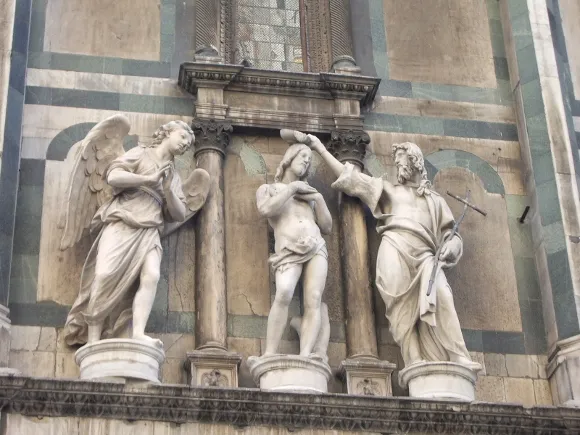John the Baptist baptizes Jesus in this "Baptism of Christ" by Andrea Sansovino (Italian, 1467–1529) and Innocenzo Spinazzi. I photographed the work while it was still on the Battistero di San Giovanni in Florence, Italy. It's now in Florence’s  Opera del Duomo Museum.