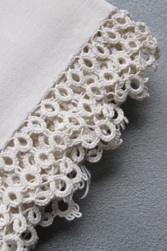 Something old -- tatting by Barbara's great-grandmother, Emma Bishop Loomis. Done some time before her daughter, Ruth Bishop's, wedding in 1898. The pillowcases have no side seams. Only seams at one end. The fabric was apparently loomed as a tube. Photo by Barbara Newhall