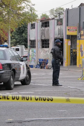 The scene of the Oakland Ghost Ship fire that killed 36 mostly young people, artists, musicians, LGBTQ folks. A few days after the fire, it was cordoned off as a "crime scene." Photo by Barbara Newhall