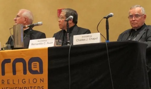 Archbishops Joseph E. Kurtz, Bernardito C. Auza and Charles J. Chaput spoke on Pope Francis and his US visit at a meeting of the Religion Newswriters Association in Philadelphia, August 28, 2015