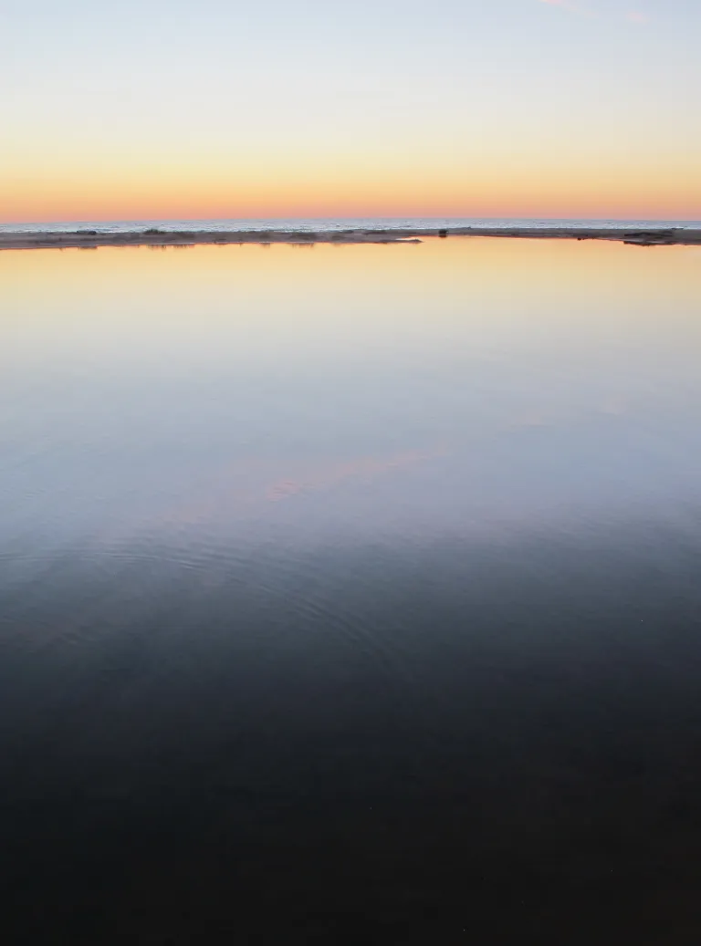 Isaiah. Lake michigan sunset. The of-courseness of God. Barbara Falconer Newhall travels up and down Michigan's lower peninsula, visiting friends and family and putting on book events for "Wrestling with God."