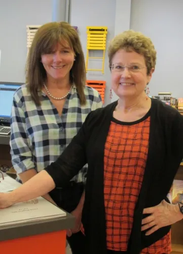 Maria Roden, owner of Orinda Books in Orinda, California, and author Barbara Falconer Newhall following Newhall's reading of her book "Wrestling with God" at the store on May 16, 2015. Photo by Jon Newhall