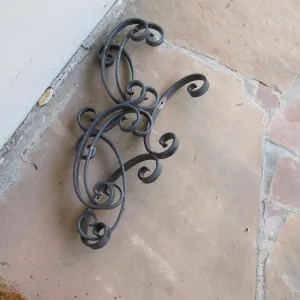 overwrought iron geegaws removed