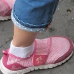 barbie-shoes-shanghai pink barbie doll shoes on a girl in shanghai. Photo by BF Newhall