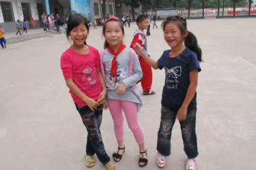chinese-schoolgirls Three stylish young Chinese schoolgirls on their playground. Photo by BF Newhall