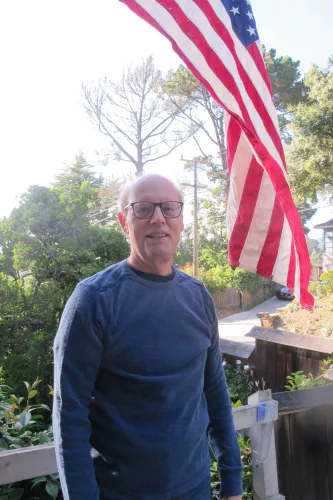 Jon Newhall and the American flag. The Stars and Stripes fly over a house in liberal San Francisco Bay. Photo by Barbara Newhall