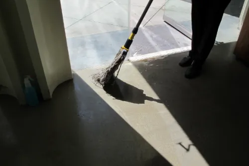 After Barbara Falconer Newhall bumped into a glass wall, spilling her latte, a barista arrived with a mop to clean up the mess. Photo by BF Newhall