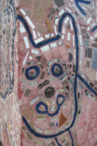 mosaic-dog The face of a dog is a detail of a mosaic on the walls of a building in Oakland, CA, Jingletown neighborhood by Isaiah Photo by BF Newhall