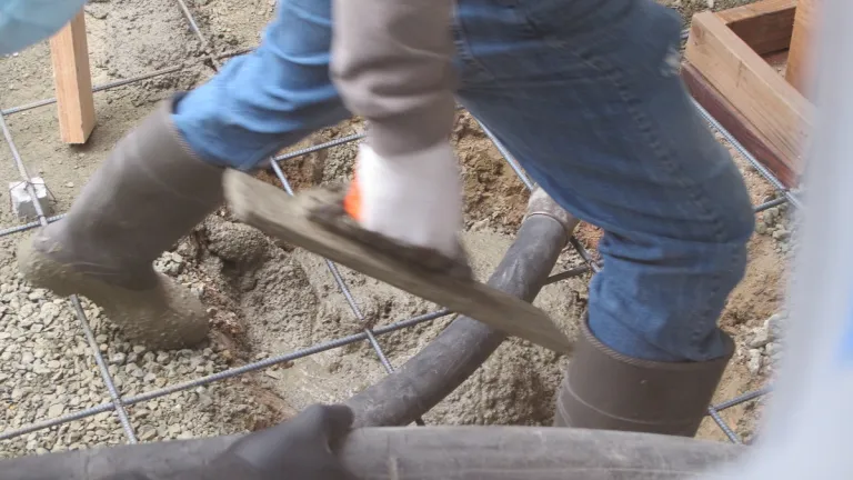 working with their hands -- construction-worker-with-trowel
