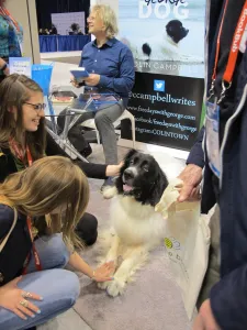 Author Colin Campbell and his Newfoundland dog George at BookExpo America 2016. Photo by Barbara Newhall