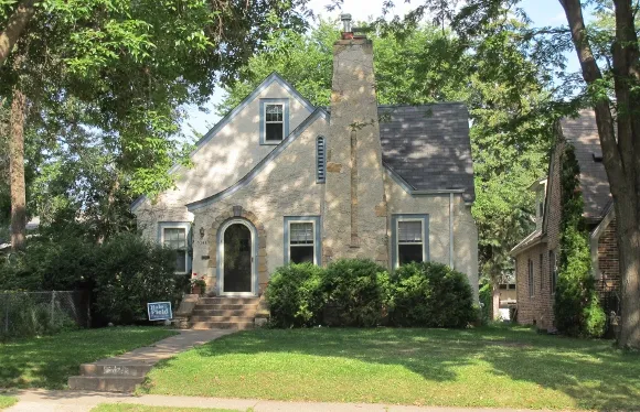 A grey-green Tudor bungalow in Minneapolis. Photo by Barbara Newhall     A grey-green Tudor bungalow in Minneapolis. Photo by Barbara Newhall