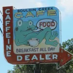 A sign for the Bouldin Creek Cafe in East Austin, TX, reads, "Caffeine Dealer." Photo by BF Newhall