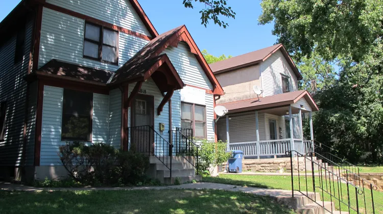 Did my long lost dead ancestors live in a house like these two old, frame houses on the 1800 block of Seventh Ave. S, Minneapolis. Photo by Barbara Newhall