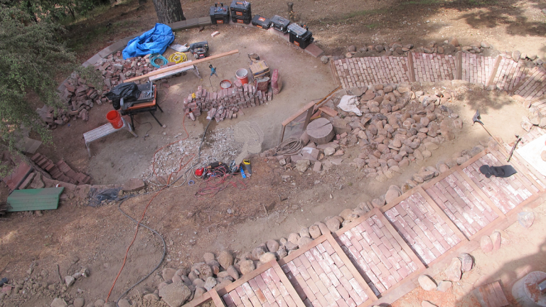 the widow laughs at the BACKYARD-CONSTRUCTION-MESS
