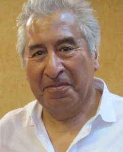close up photo of the face of author Richard Rodriguez at Faith Presbyterian Church, Oakland, CA. Photo by Barbara Newhall