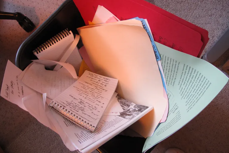 Experiencing the shame of aging, a writer has tossed old filed in a wastebasket. the Big Seven-Five. Photo by Barbara Newhall