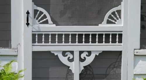 Detail of a screen door on a 19th century house in Pentwater, MI. Photo by BF Newhall