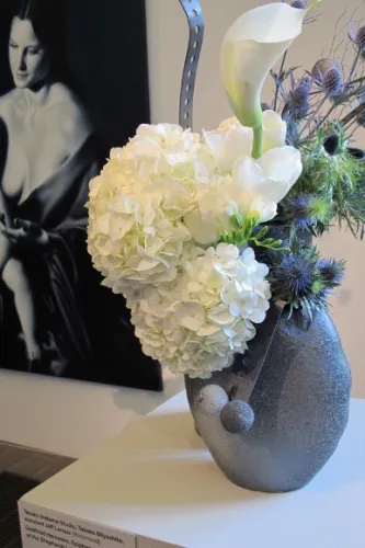 From Takako Miyashita a floral arrangement to complement Gottfried Heinwein's Epiphany II, 1998. Photo by BF Newhall