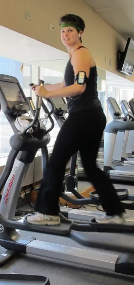 Young woman working okut on the eliptical machine at Marriott City Center, Minneapolis. Photo by BF Newhall