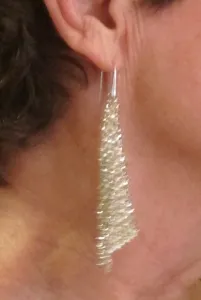 swarovsky-fit-silver-shade-earrings Woman wearing Swarovsky Fit Silver Shade earrings. Photo by BF Newhall