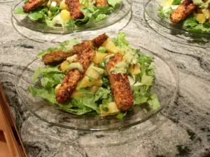 A salad of lettuce, tempeh sticks and grapefruit. Photo by BF Newhall