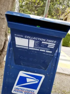 I'm breaking rules today, gluing postage stamps to an envelope. Desperate times, desperate measures