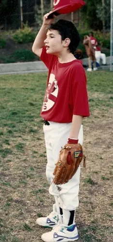 Peter Newhall lifts his baseball cap during practice. Photo 1991 by BF Newhall