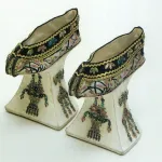 qing dynasty ornately embroidered elevated shoes possibly worn by the dowager empress Cixi maybe wore.