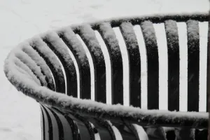 Snow collects on the rim of a well-designed trash can at Eden Prairie, MN, Community Center. Photo by BF Newhall