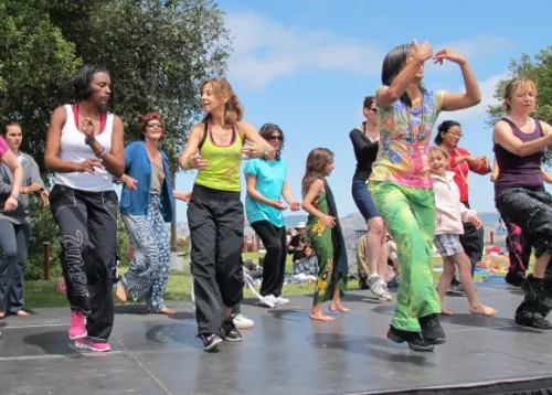 zumba-dancers-center-stage Toni Warren, Kathleen Ostler and Sandra Franklin lead Zumba dancing. Photo by Jon Newhall