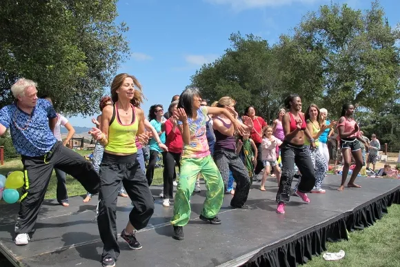 zumba-leaders-&-dancers-on-stage Zumba teachers lead a dance on stage at The Hills. Photo by Jon Newhall