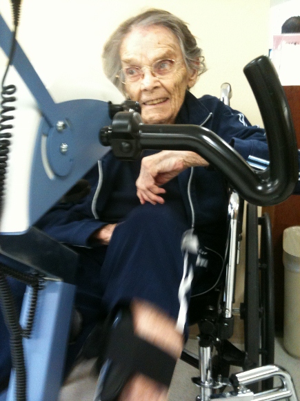 Tinka Falconer on the exercise bike after broken hip.